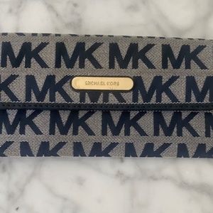 Michael Kors blue wallet MK logo button closure